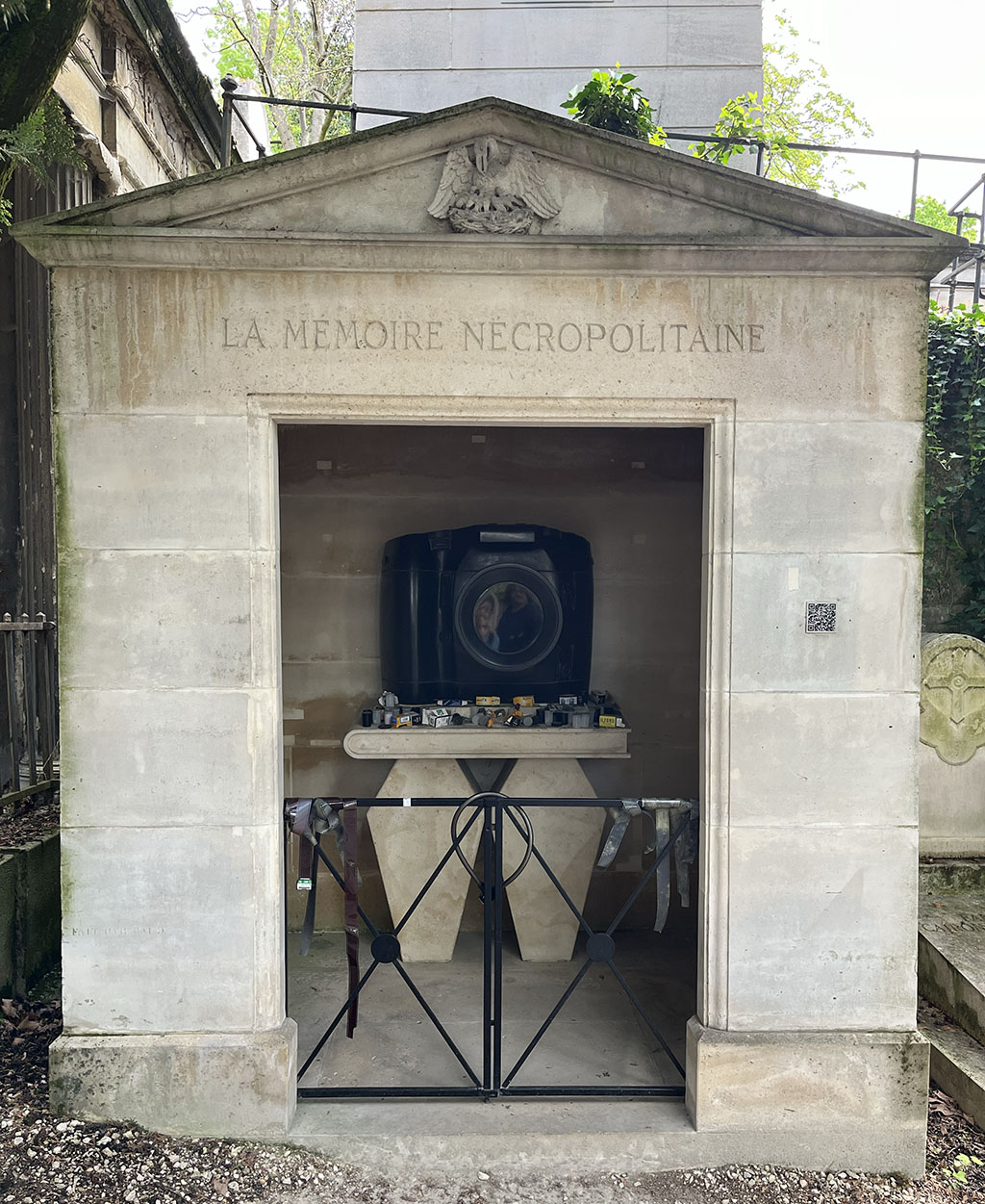 masoleum with a giant camera