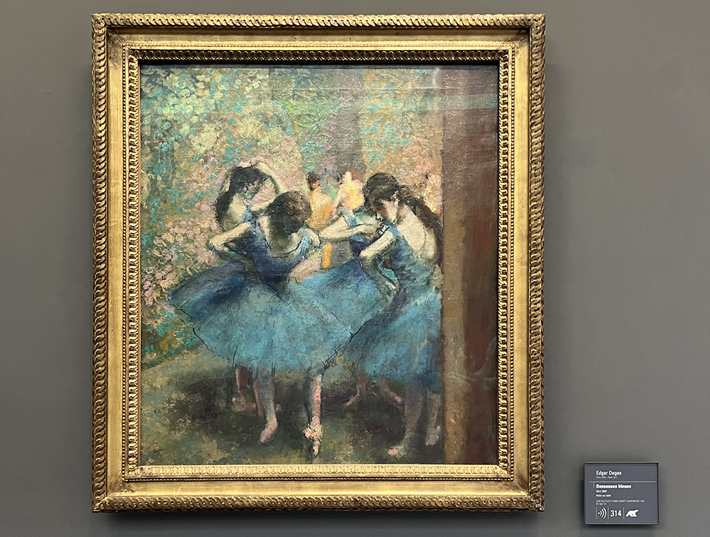 painting of ballerinas in blue costumes