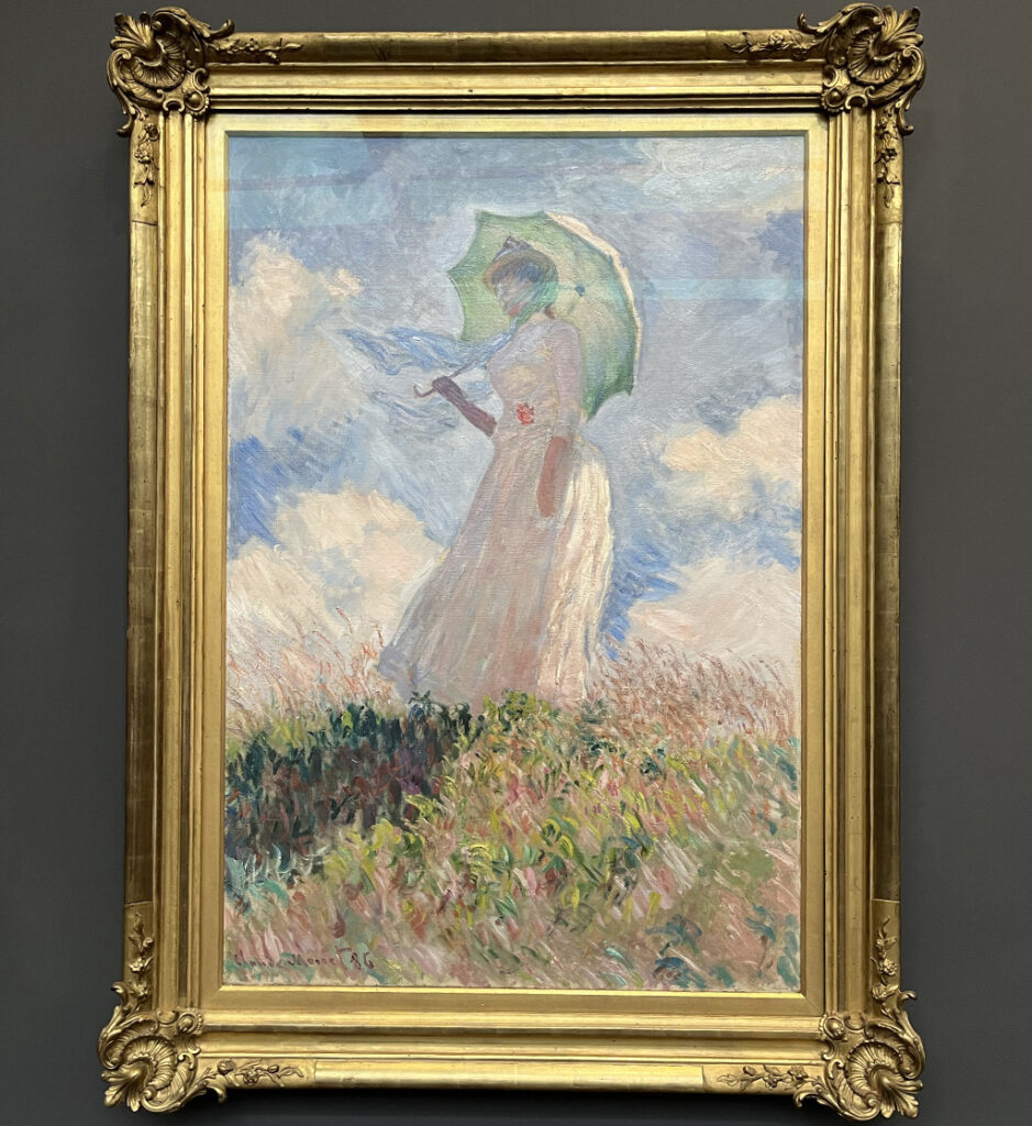 painting of a woman on a hill with a parasol