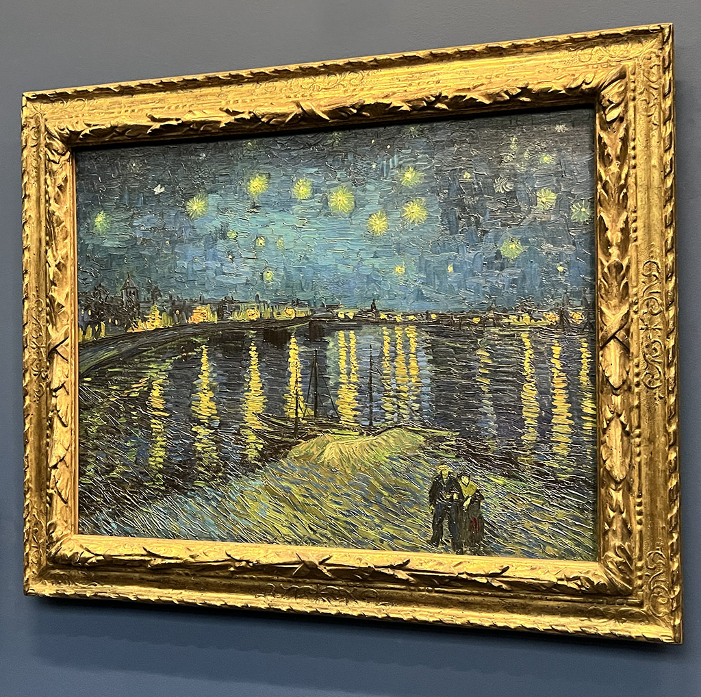 painting of a city at night