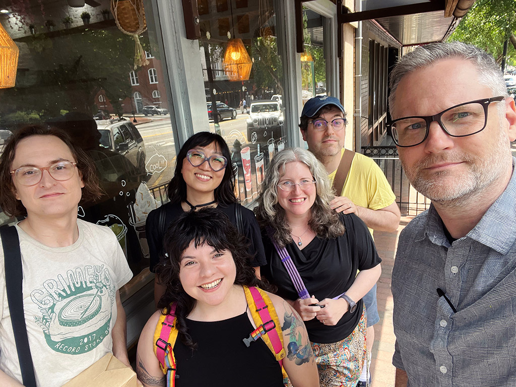 six friends taking a group selfie