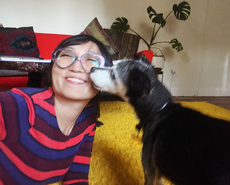 dog licking girls cheek